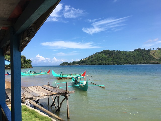 outrigger canoes in Kiluan Bay